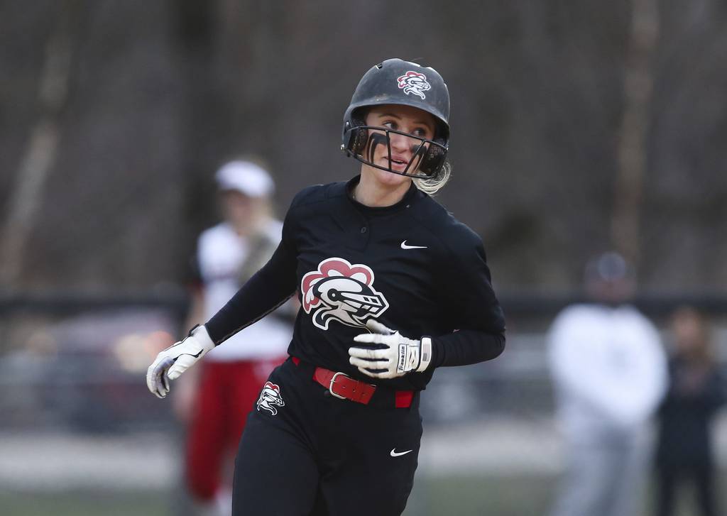Lincoln-Way Central's Sarah Kmak (8) rounds the bases after hitting a home run in the sixth inning against Marist during a nonconference game in New Lenox on Monday, April 3, 2023.
