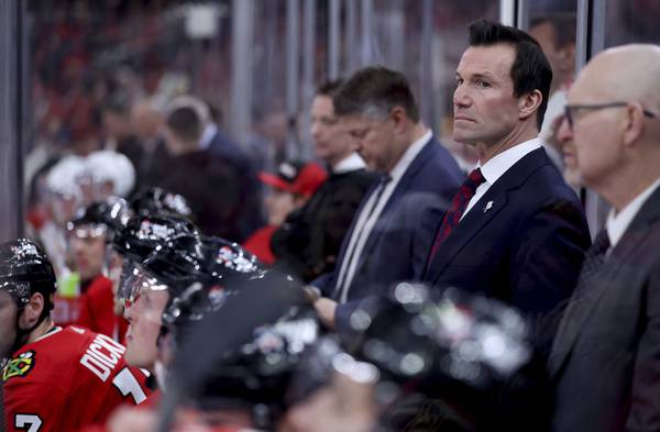 Blackhawks coach Luke Richardson looks on from behind the bench against the Ducks on Feb. 7 at the United Center. 