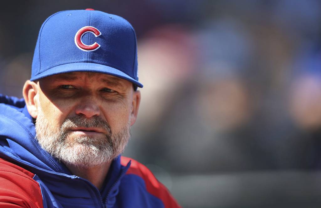 Cubs manager David Ross relaxes before a game against the Rangers on Saturday at Wrigley Field.