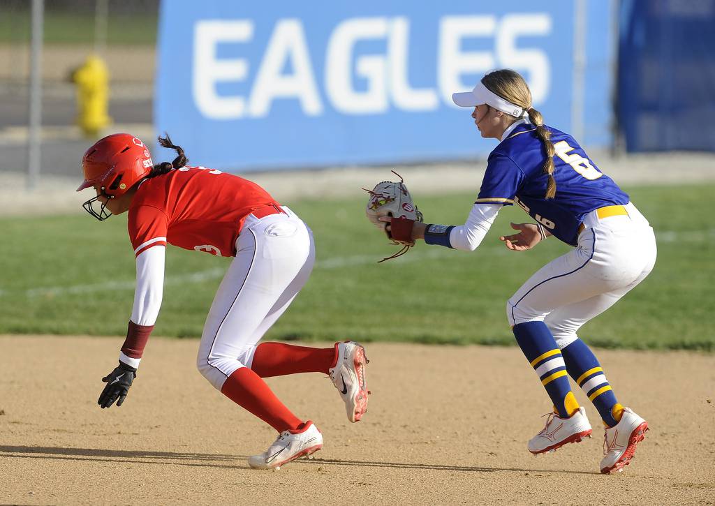 Sandburg shortstop Zoe Trunk (6) tags out Homewood-Flossmoor's Skylar Skinner (3) in a rundown during a SouthWest Suburban Blue game in Orland Park on Tuesday, April 18, 2023.