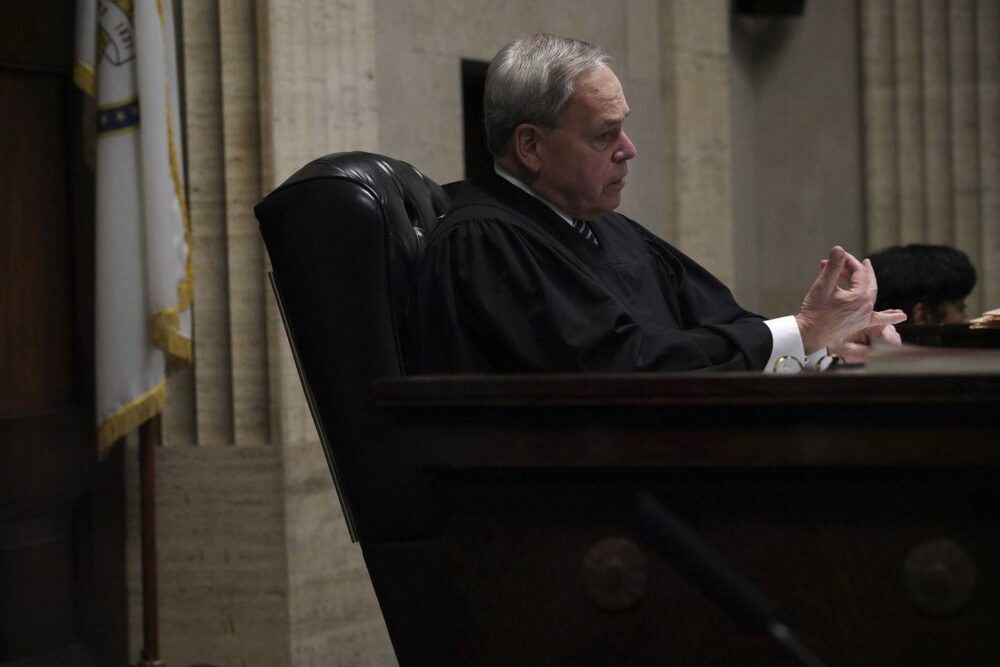 On a typical day before Judge Lawrence Flood, shown on the bench in 2019, the courtroom atmosphere was calm, quiet and slow-paced.