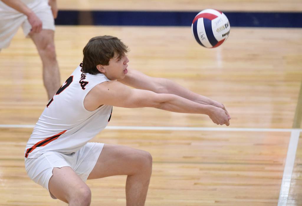 Lincoln-Way West's John Ladd (2) returns a serve against Lincoln-Way East during a SouthWest Suburban Conference crossover in Frankfort on Thursday, April 20, 2023.