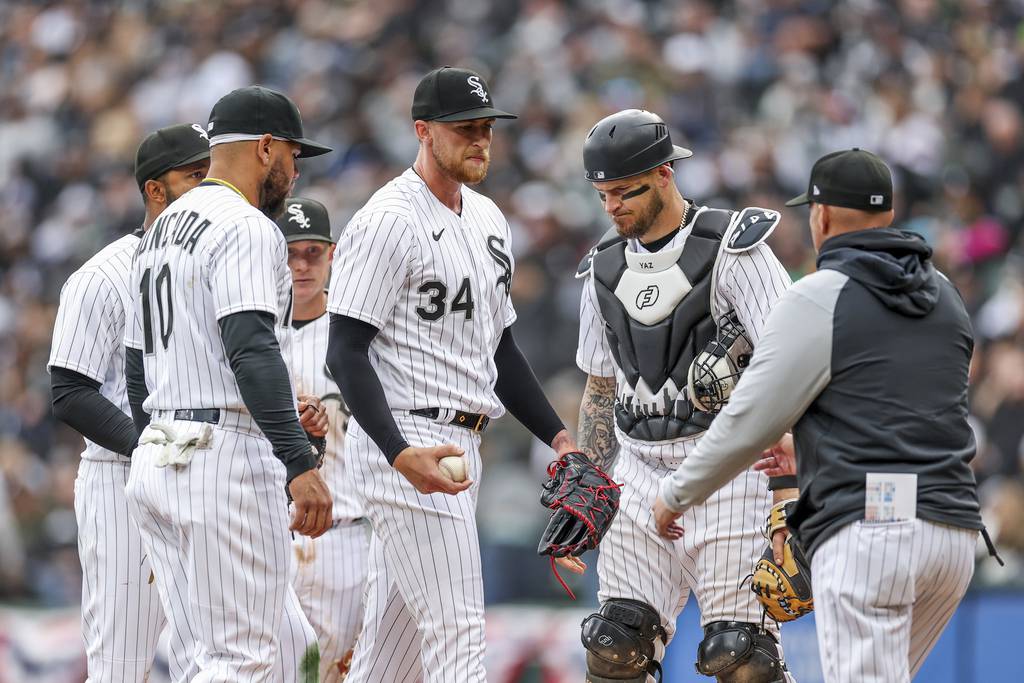 White Sox manager Pedro Grifol, right, takes out starting pitcher Michael Kopech after Kopech allowed four runs in the fifth inning Monday, April 3, 2023, at Guaranteed Rate Field.