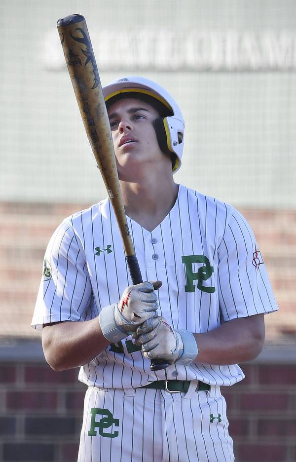 Providence's Sammy Atkinson appears to give an order to his bat before stepping up to the plate against St. Rita during a Catholic League Blue game in New Lenox on Tuesday, April 18, 2023.