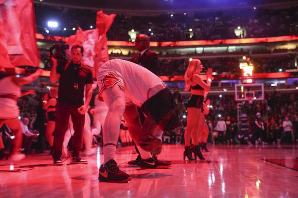 Bulls center Andre Drummond stretches before playing the Spurs at the United Center on Feb. 6, 2023.
