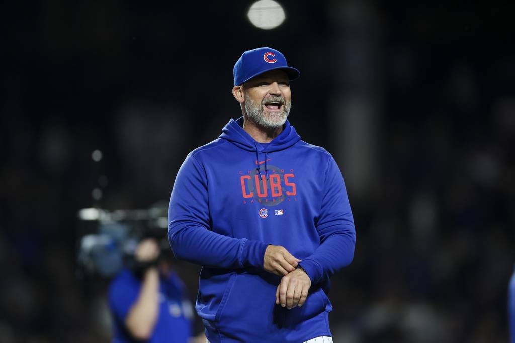 Cubs manager David Ross walks on the field after the walk-off win at Wrigley Field on April 10, 2023.