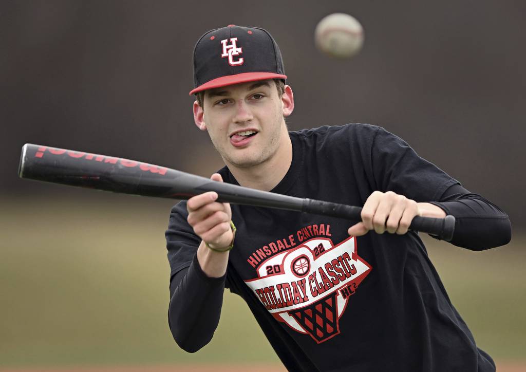 Hinsdale Central’s Ben Oosterbaan squares to bunt during a practice on campus in Hinsdale on Thursday, March 30, 2023. 