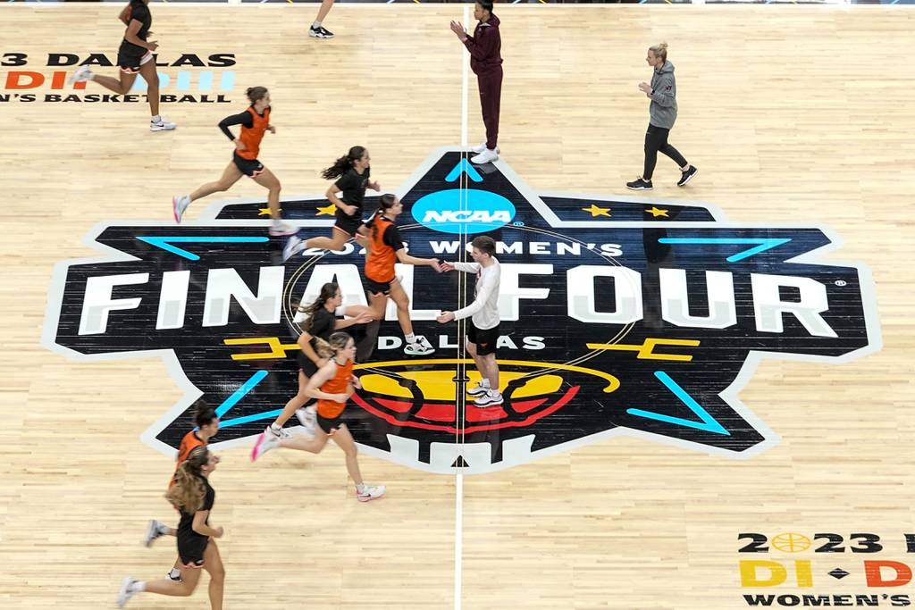 Virginia Tech players run a drill during a practice session for the Final Four on March 30, 2023.