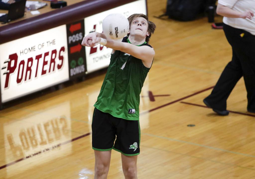 Oak Lawn’s Simon Komperda (7) bumps the ball against Lockport during a nonconference match in Lockport on Thursday, April 6, 2023.