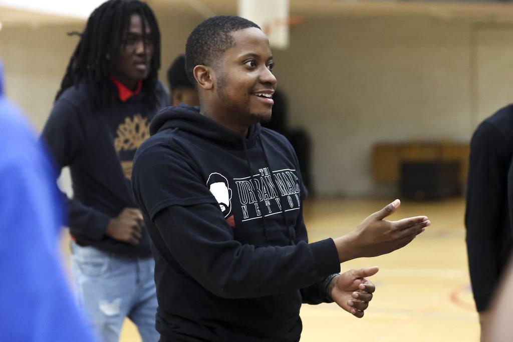 Marlon Haywood, executive director of Urban Male Network, talks to students on April 20, 2023, on the Near West Side.