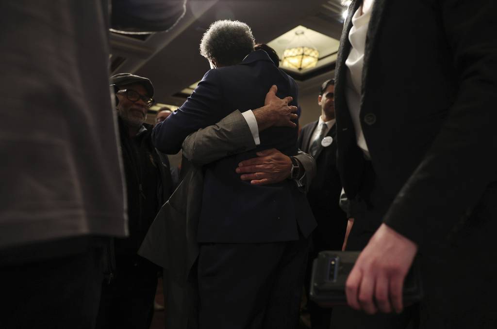Mayor Lori Lightfoot is embraced by a supporter after giving her concession speech during her reelection night watch party, Feb. 28, 2023.