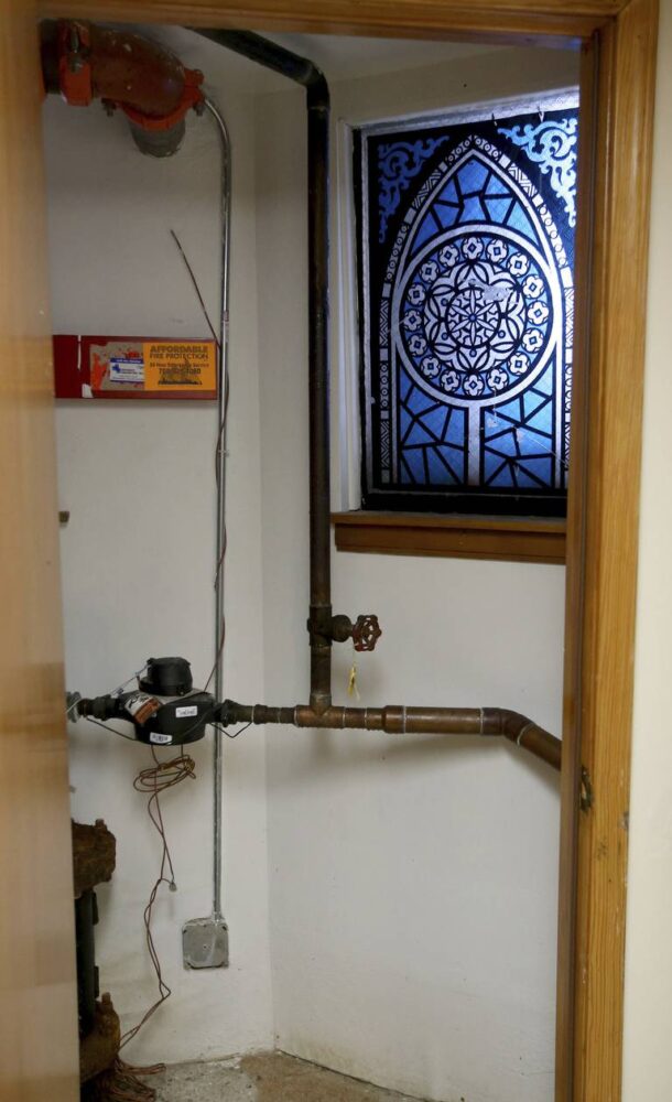 A facilities room at El Hogar Del Niño, a day care in Chicago's Pilsen neighborhood, where the nonprofit group Elevate Energy helped replace a lead service line, a water heater and a boiler.