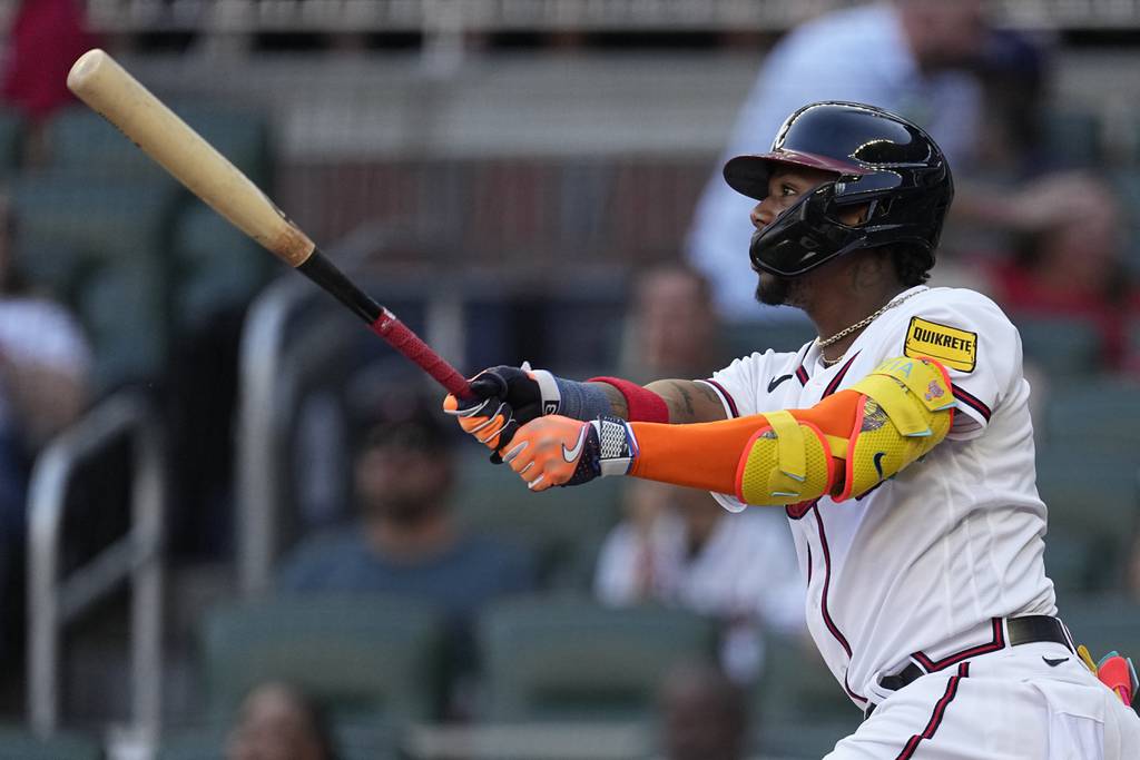 Braves right fielder Ronald Acuna Jr. hits a home run in the first inning against the Twins on June 27, 2023.