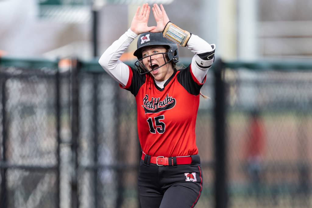 Marist’s Isabel Cunnea celebrates on her way to the plate after hitting a home run against Evergreen Park during a nonconference game in Evergreen Park on Thursday, March 23, 2023.