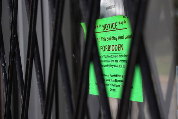 A notice forbidding entrance into the building located at 1001 S. 17th Ave. is posted on the door on July 28, 2023.