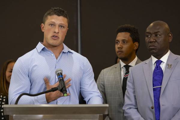Former Northwestern football player Tom Carnifax speaks on July 19, 2023, alongside other former players and their attorneys, Ben Crump and Steven Levin, about the abuse and hazing they say occurred in the program.