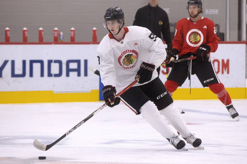 Sam Rinzel practices with teammates during the Blackhawks prospect development camp at Fifth Third Arena on July 14, 2022.