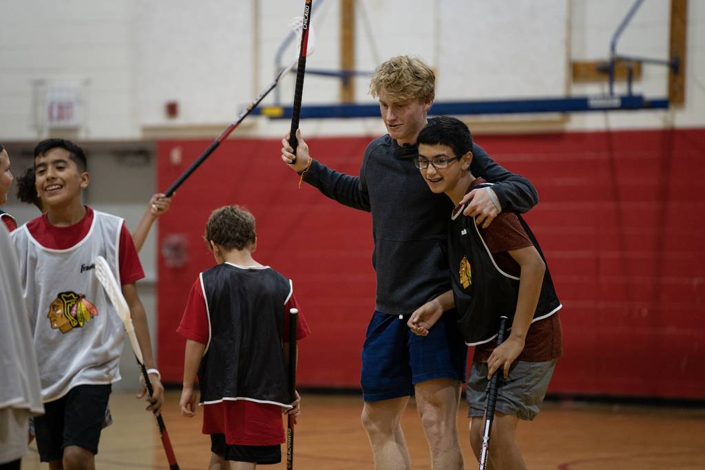 Oliver Moore and other Blackhawks draft picks play floor hockey with kids from the James R. Jordan Boys and Girls Club on the Near West Side on Wednesday, July 5, 2023.