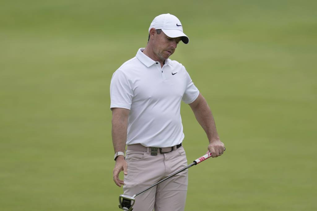Rory McIlroy reacts on the 18th green during Round 3 of the British Open Golf on Saturday at the Royal Liverpool Golf Club in Hoylake, England. He shot a 2-under 69 and is nine shots behind leader Brian Harman.
