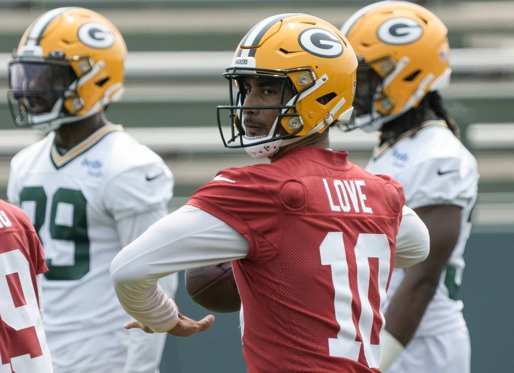 Packers quarterback Jordan Love drops back to pass during a minicamp practice June 14, 2023, in Green Bay.