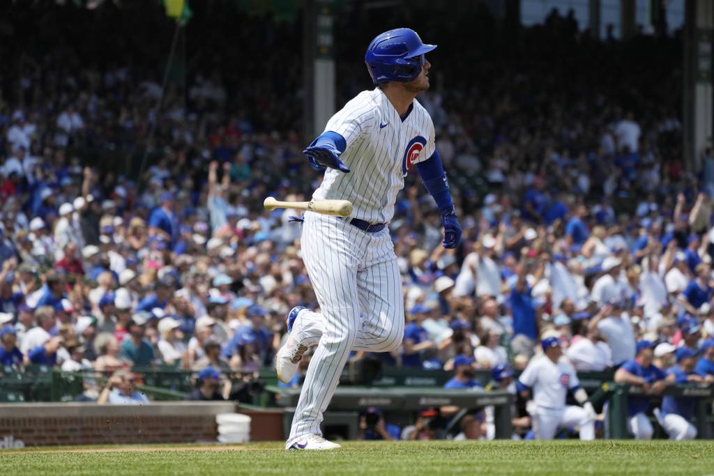 Chicago Cubs' Cody Bellinger watches his two-run home run during the first inning on July 23, 2023.