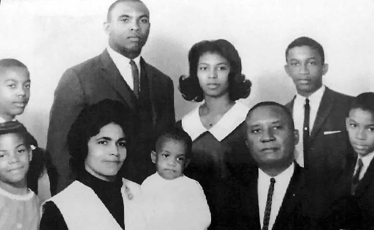 A childhood photo of Bears President and CEO Kevin Warren, bottom center, with his family. Top row from left are brother Wayne, brother Morrison, sister Carolyn and brother Dwight. Bottom from left are sister Marilyn, mother Margaret, father Morrison and brother Howard.