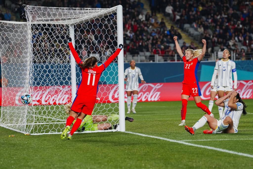 Norway players celebrate after Philippines' Alicia Barker, bottom right, scored an own goal during a World Cup match on July 30, 2023.