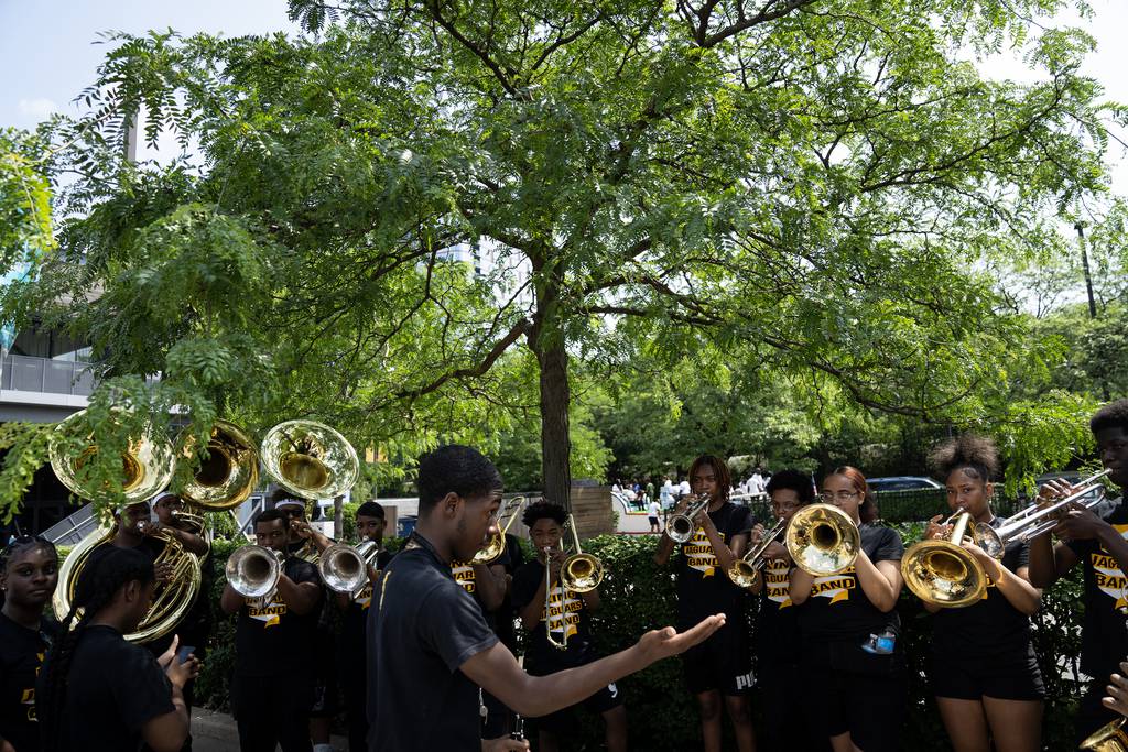 The King College Prep Soul Train of Chicago Marching Band tune up before the 4th on 53rd Parade on July 4, 2023.