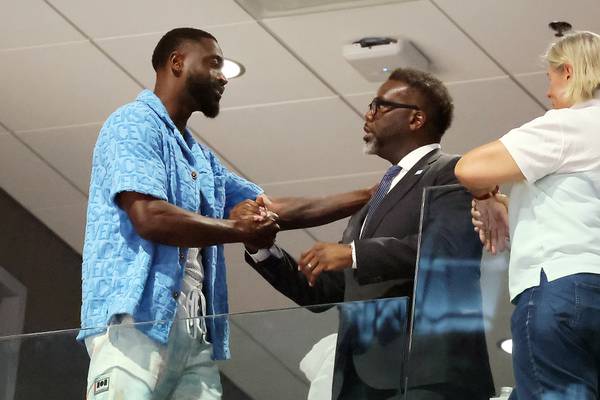Dwyane Wade greets Chicago Mayor Brandon Johnson in a Wintrust Arena skybox during the Sky-Aces game on Tuesday, July 25, 2023.