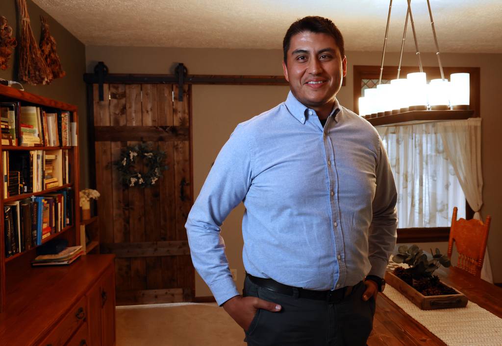 Ramon Diaz, a former Northwestern University football player, is seen at home on July 12, 2023.