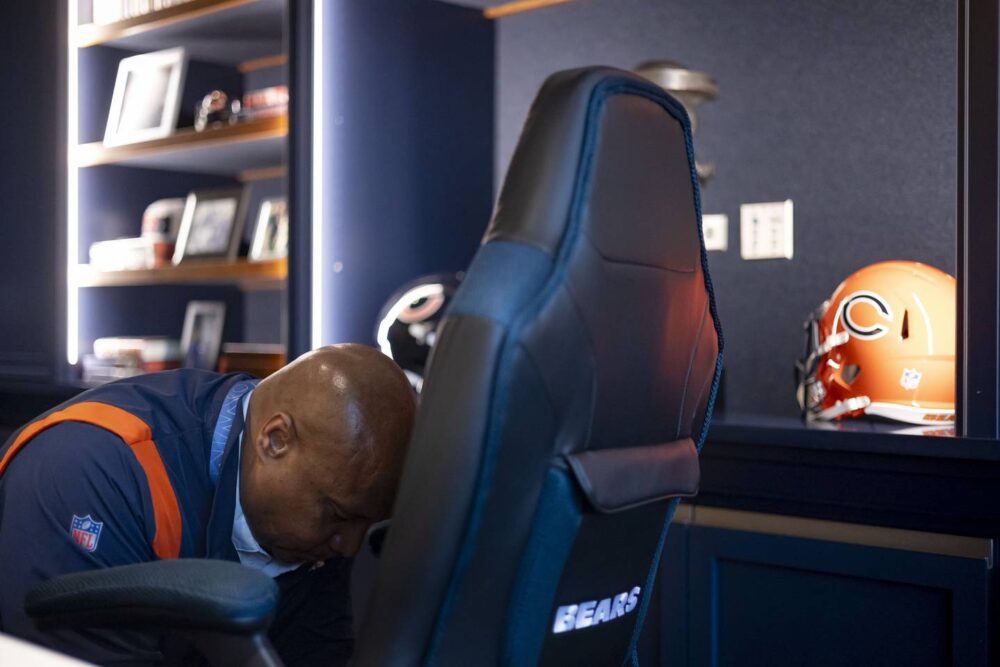Bears President Kevin Warren starts his day with a prayer in his office.