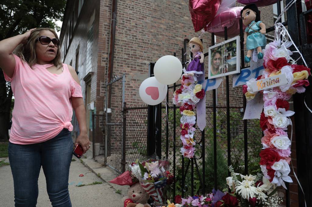 Alicia Acevedo, a mental health advocate, talks about Karina Gonzalez and her daughter Daniela Alvarez, 15, near a memorial dedicated to them outside the Alvarez home in the 2600 block of South Millard Avenue in Chicago’s Little Village neighborhood on July 5, 2023.