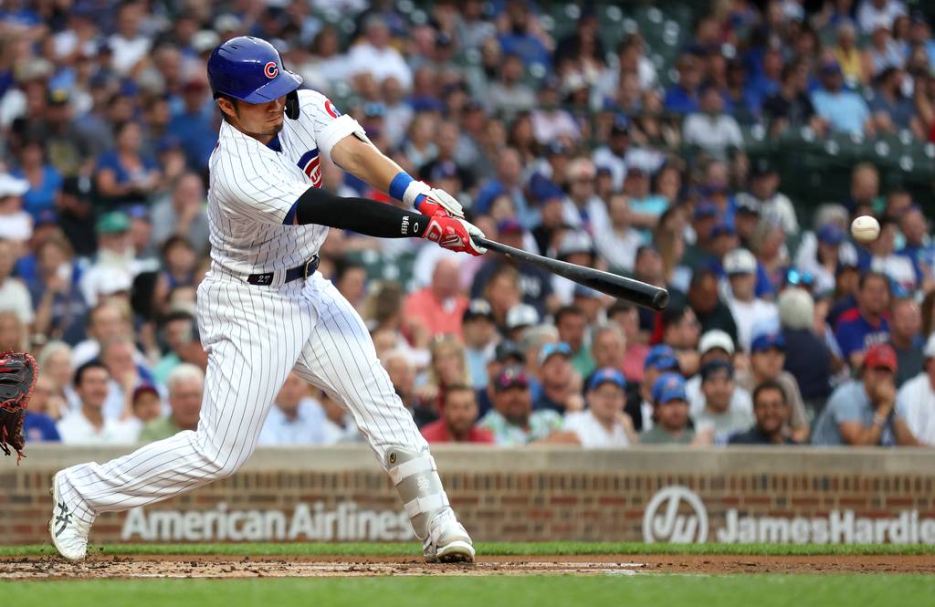 Cubs right fielder Seiya Suzuki singles in the first inning against the Nationals on Wednesday at Wrigley Field.