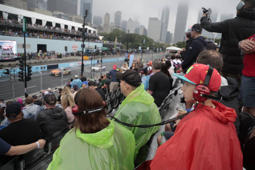 Fans watch the start of the NASCAR Cup Series race at Grant Park on July 2, 2023, in Chicago. Heavy rain delayed the race.