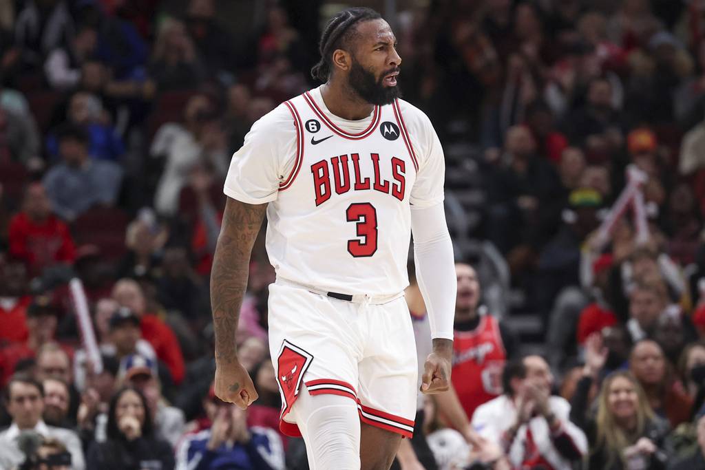 Bulls center Andre Drummond runs down the court after scoring against the Spurs during the fourth quarter at the United Center on Feb. 6, 2023.