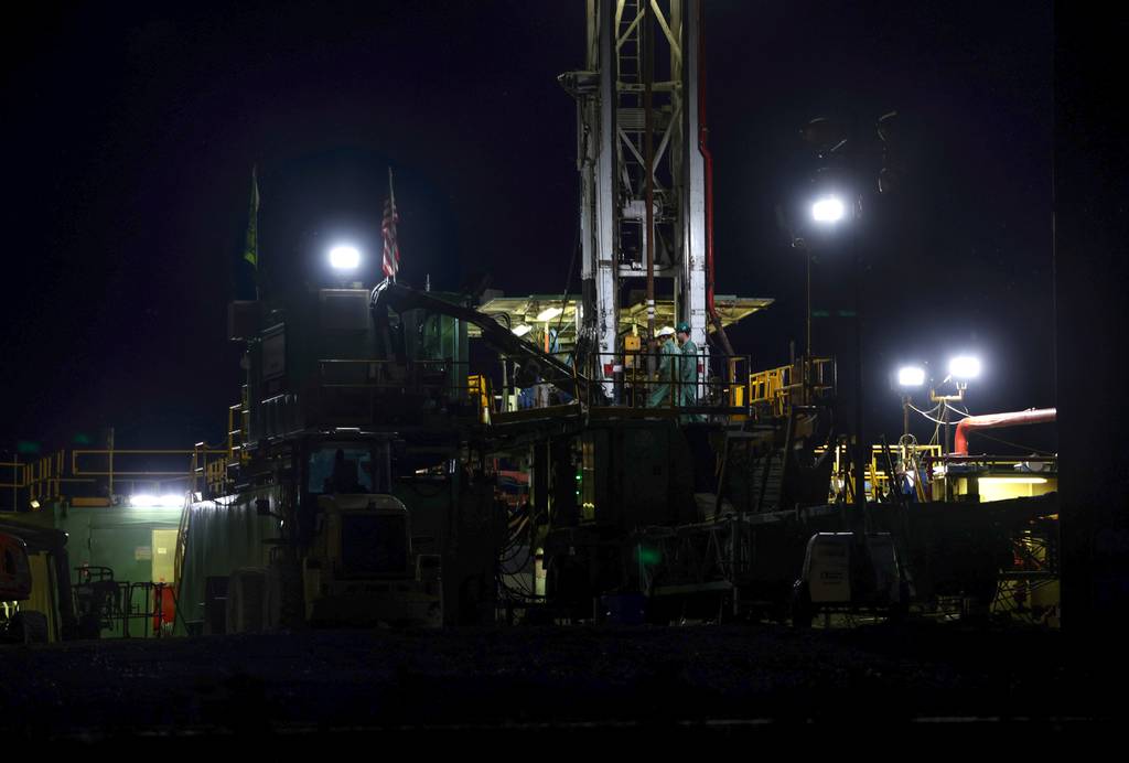 Bright lights illuminate a 24/7 Navigator CO2 drilling site at night along Oconee Avenue on May 18, 2023, in rural Nokomis.