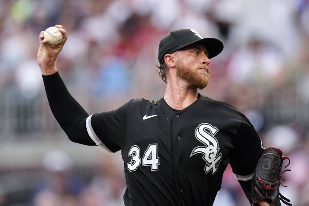 White Sox starting pitcher Michael Kopech delivers in the first inning against the Braves on Friday in Atlanta. Kopech lasted just two-thirds of an inning, allowing four runs on one hit and four walks. 