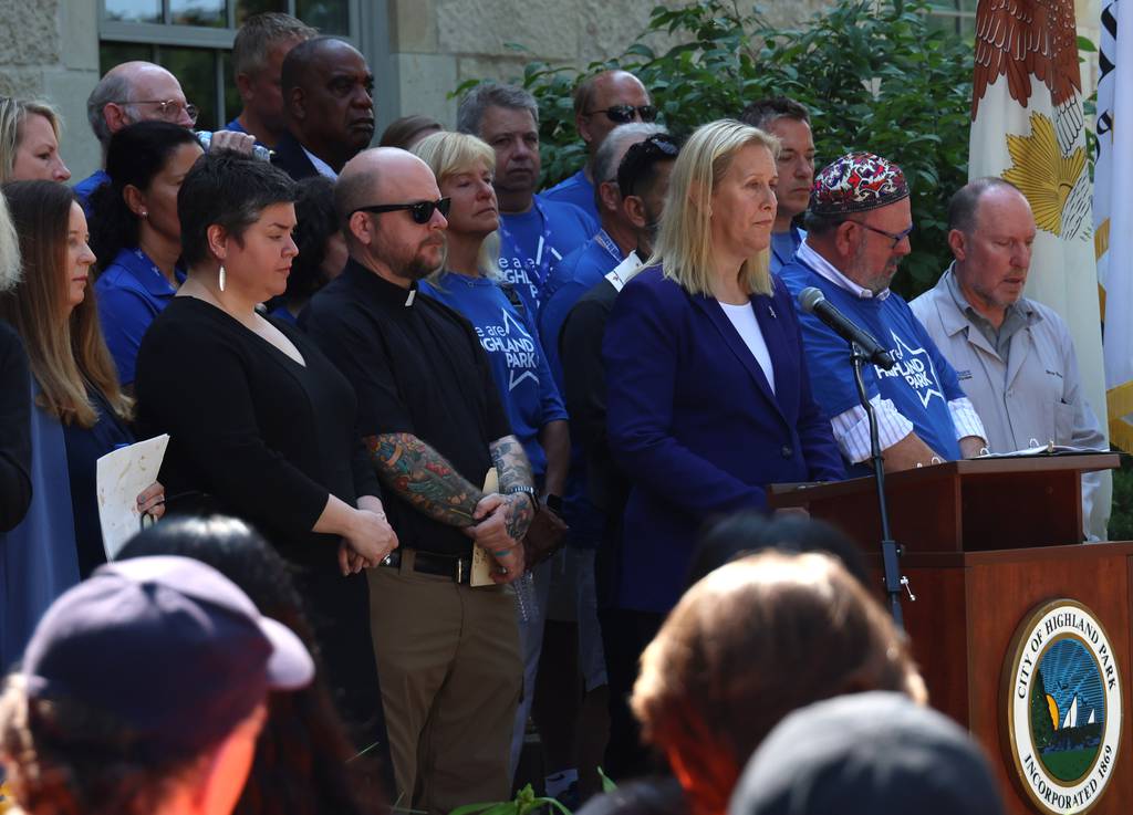 Highland Park Mayor Nancy Rotering leads a moment of silence, July 4, 2023, during a remembrance ceremony honoring the victims and survivors of the Highland Park mass shooting.