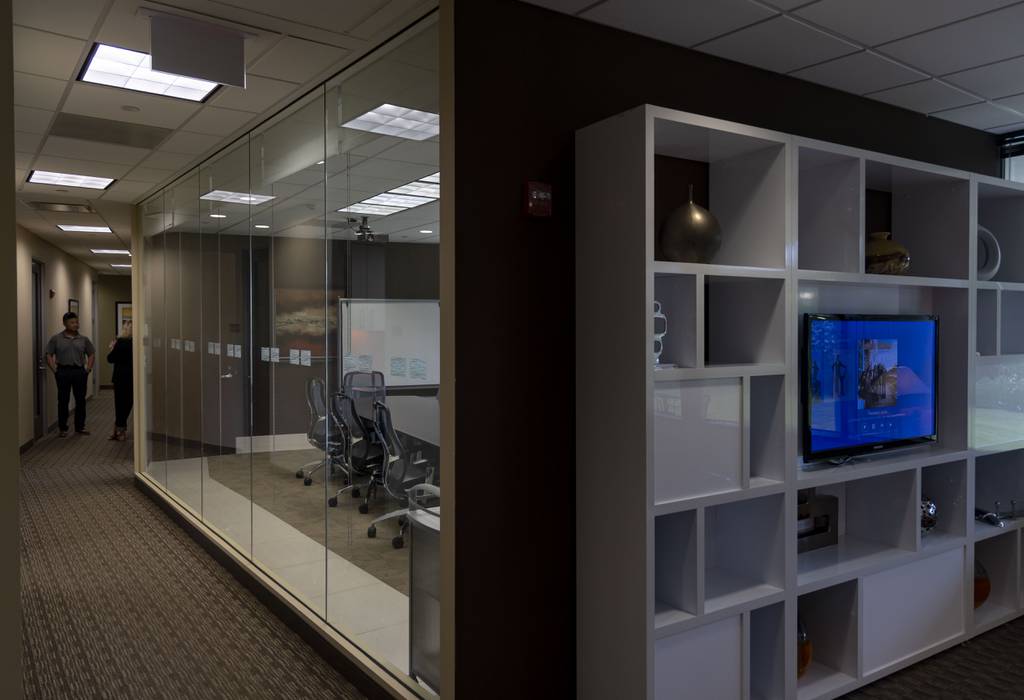 An entry lobby and a conference room along the hallway at a Regus co-working facility on June 15, 2023, in Lake Forest. 