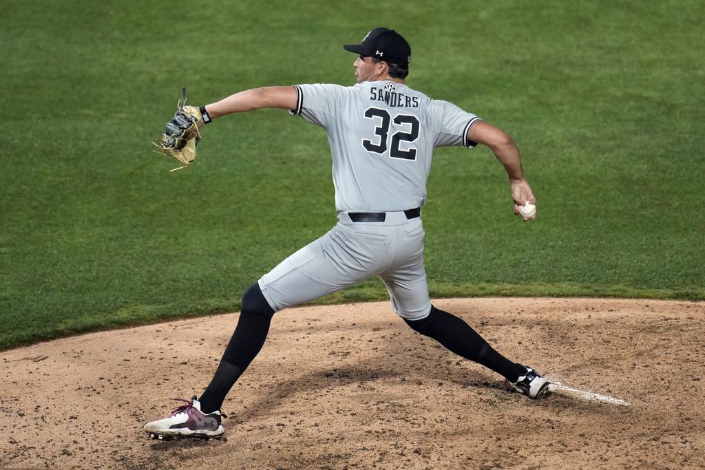 South Carolina pitcher Will Sanders throws to Florida batter during the sixth inning of an NCAA super regional game on June 9, 2023.