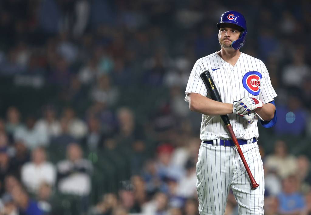 Chicago Cubs designated hitter Trey Mancini heads to the dugout after striking out in the eighth inning on June 27, 2023. 