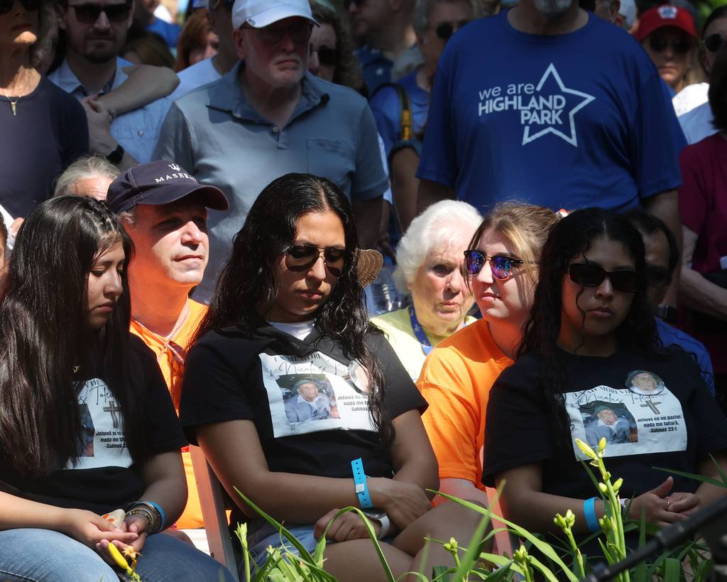 The family of Nicolás Toledo listen to speakers during a remembrance ceremony outside of Highland Park City Hall on July 4, 2023, in Highland Park. Katie Goldstein, Irina McCarthy, Kevin Michael McCarthy, Stephen Straus, Jacki Lovi Sundheim, Nicolás Toledo, and Eduardo Uvaldo were killed during a mass shooting during the city's annual Fourth of July parade.