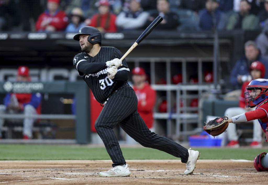 White Sox slugger Jake Burger hits a three-run home run in the first inning against the Phillies on April 18 at Guaranteed Rate Field.