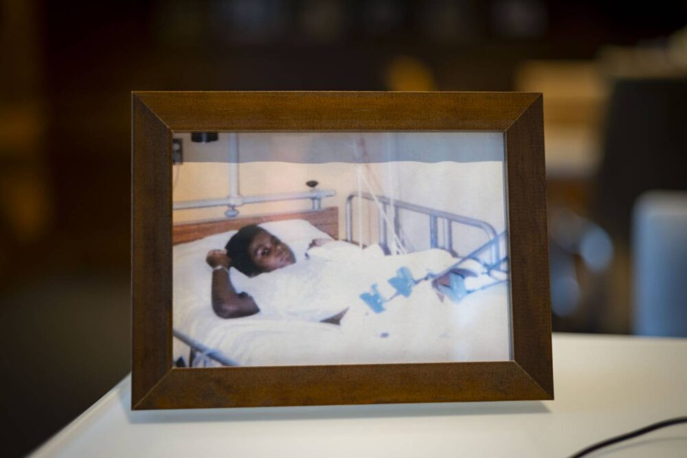 A photo in Kevin Warren's office at Halas Hall that shows him recovering in a hospital bed after a childhood accident.