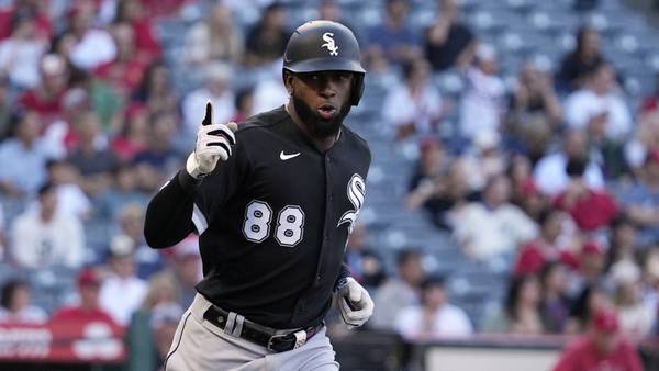 White Sox center fielder Luis Robert Jr. gestures after hitting a two-run home run against the Angels on June 28, 2023, in Anaheim, Calif.