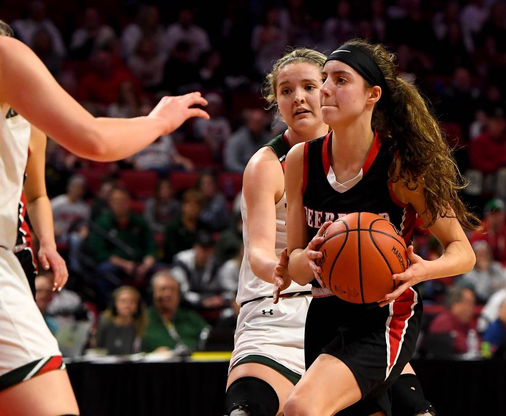 Deerfield’s Nikki Kerstein, right, drives to the basket during a Class 3A state semifinal against Lincoln at Illinois State’s CEFCU Arena in Normal on Friday, March 3, 2023.
