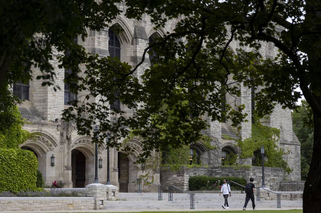 People walk the campus at Northwestern University on July 11, 2023, in Evanston.