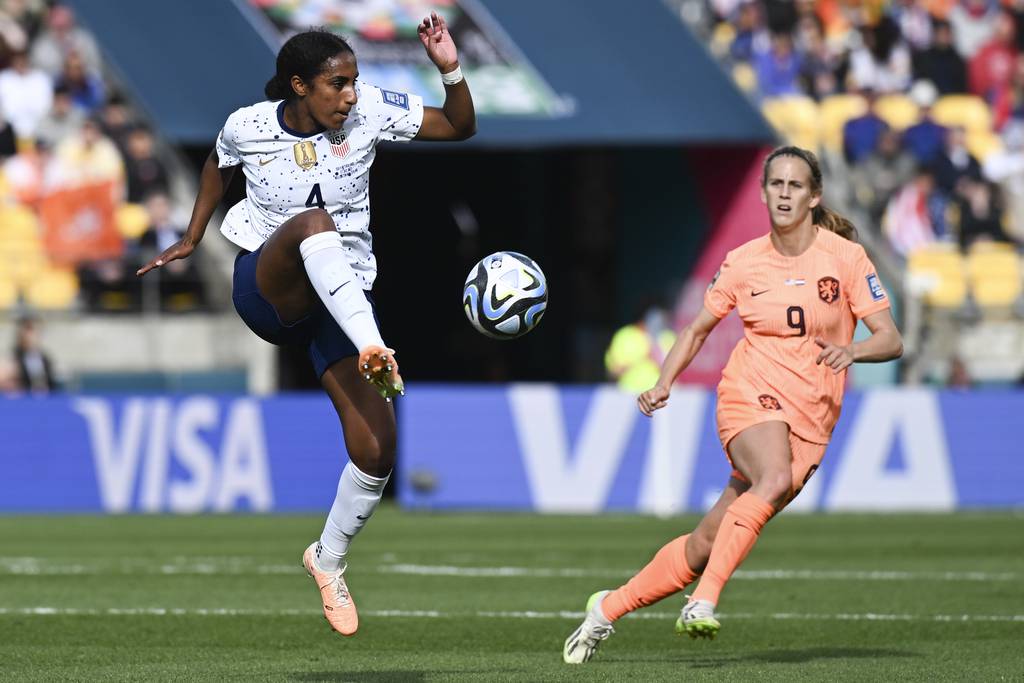 United States' Naomi Girma attempts to control the ball as Netherlands' Katja Snoeijs watches during the World Cup match on July 27, 2023. 