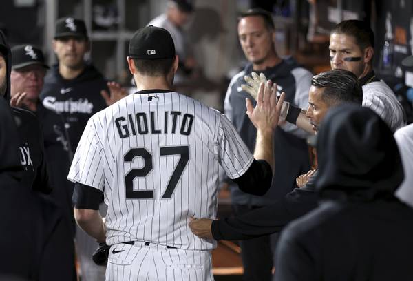 White Sox starter Lucas Giolito is congratulated in the dugout after being pulled in the seventh inning against the Rays on April 28, 2023, at Guaranteed Rate Field.