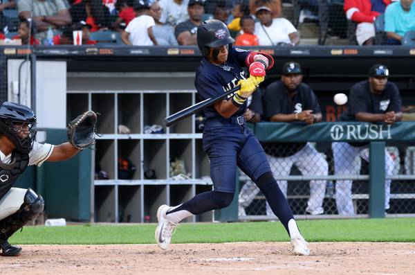 Torii Chaney of the West team hits an RBI single in the fourth inning of the Double Duty Classic on Tuesday, July 18, 2023, at Guaranteed Rate Field.